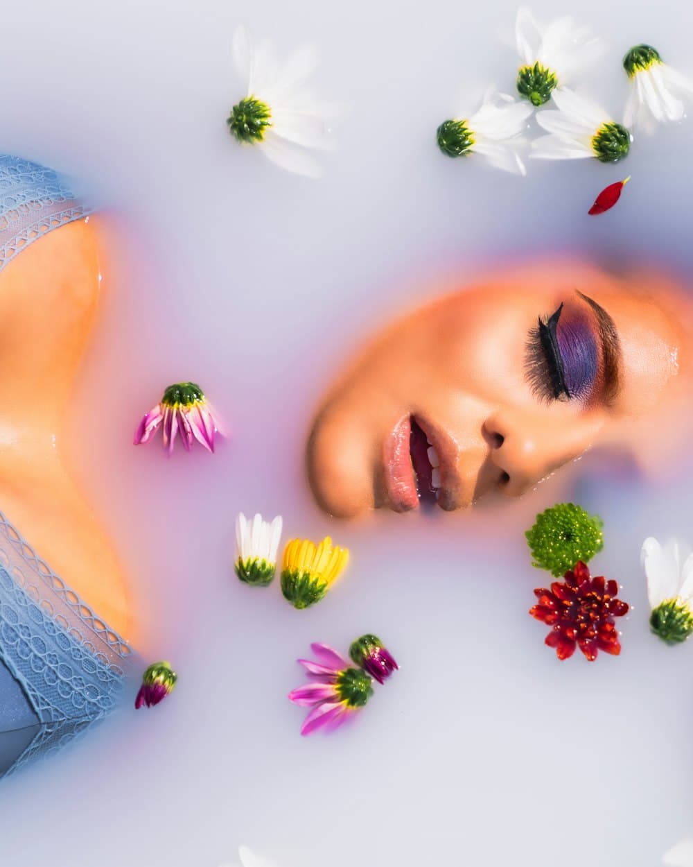 A finished editorial beauty look, styled in natural light
